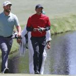 Tiger Woods and Jon Rahm at The Masters 2022